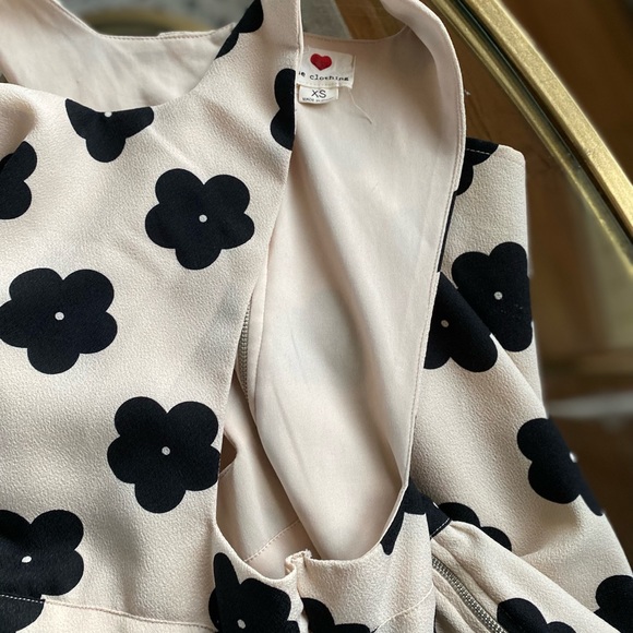 Cream and Black Floral Mini Dress with Cut out sides, sinch waist and skirt - Picture 7 of 7